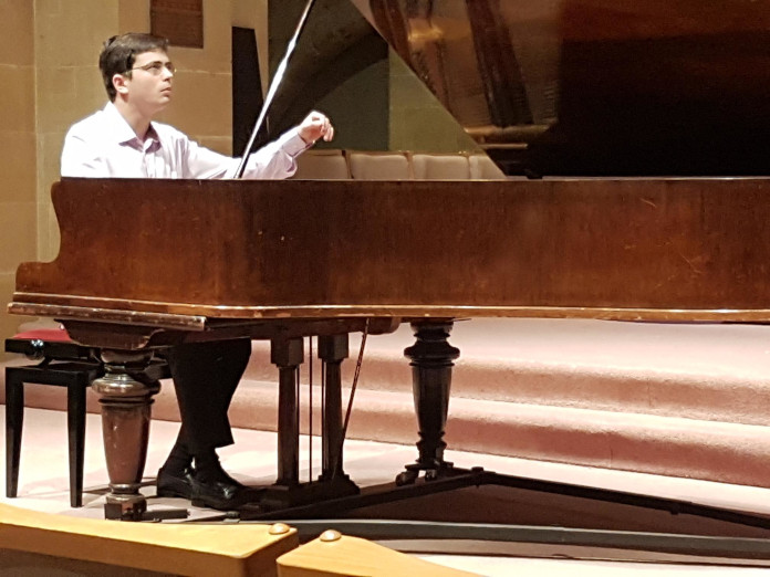 Ariel Lanyi playing the piano