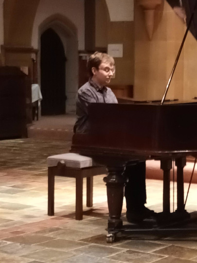 Dominic Degavino playing the piano